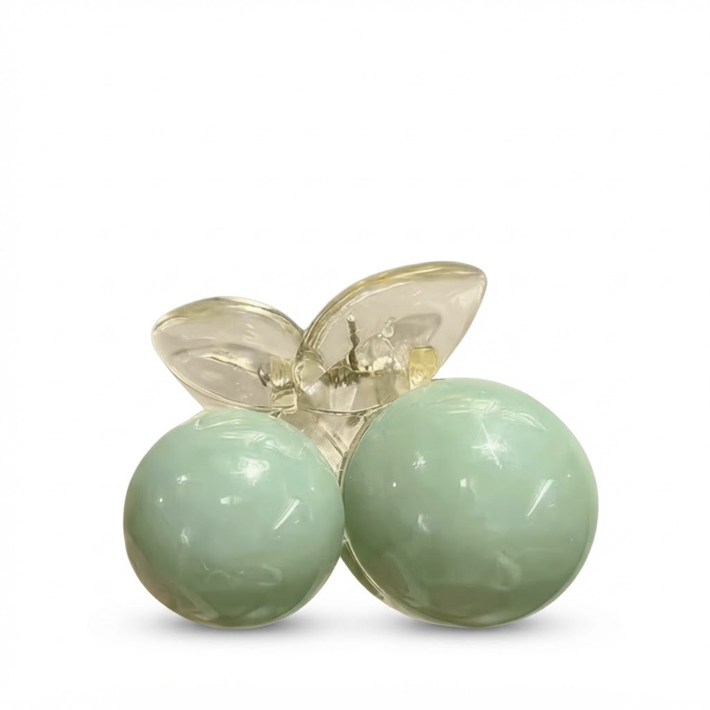 Pinza dos esferas verde - foto de producto sobre fondo blanco